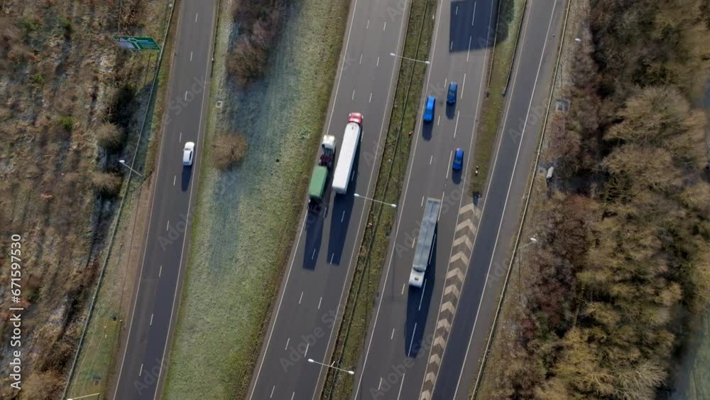 Motorway Driving in the UK Aerial View Showing Lorries, Vans, Cars and Vehicles Motorway Driving in the UK Aerial View Showing Lorries, Vans, Cars and Vehicles