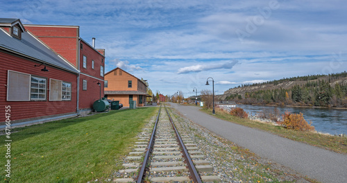 Railroad tracks and hiking trail beside the Yukon River at Whitehorse, Yukon, Canada photo