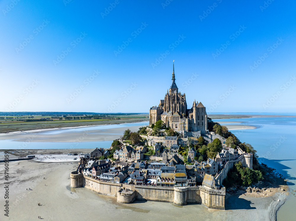 Aerial view Mont-Saint-Michel monastery and abbey, Le Mont-Saint-Michel, salt marshes, Normandy, France - obrazy, fototapety, plakaty 