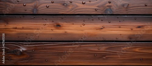 Rain falling onto a wooden surface