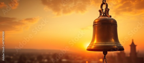 Silhouette of old church bell a serene and sacred place symbolizing religion at sunset photo
