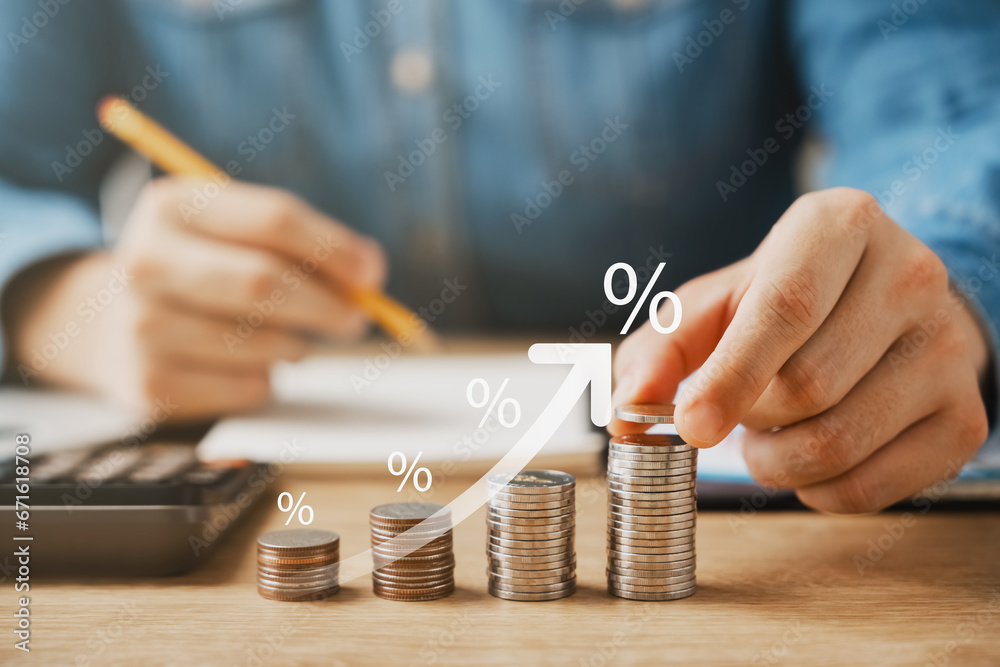 Interest rate and dividend concept, Coins stack with percentage symbol and up arrow, return on stocks and mutual funds, long term investment for retirement. - obrazy, fototapety, plakaty 