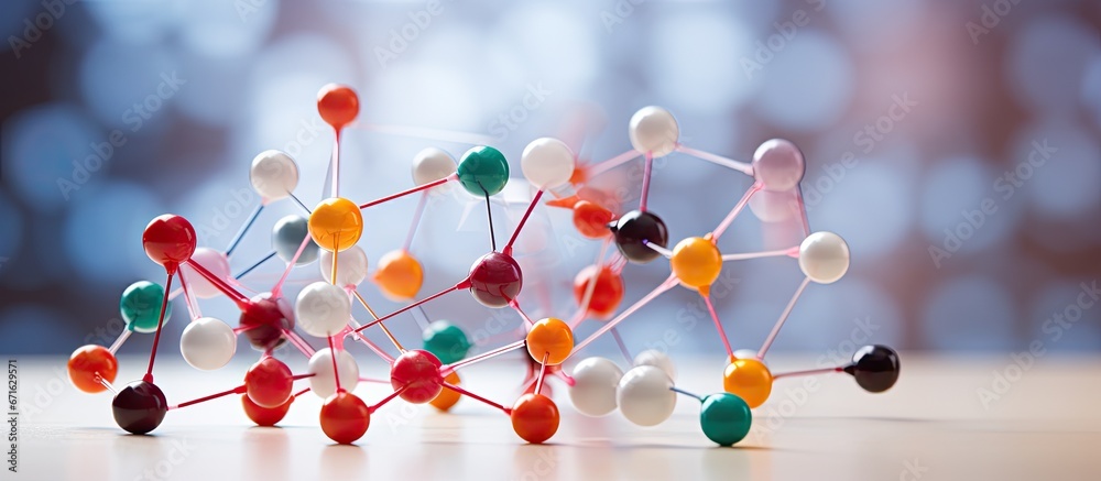 Chemistry education focuses on a colorful model of a molecule made with foam and toothpicks - obrazy, fototapety, plakaty 