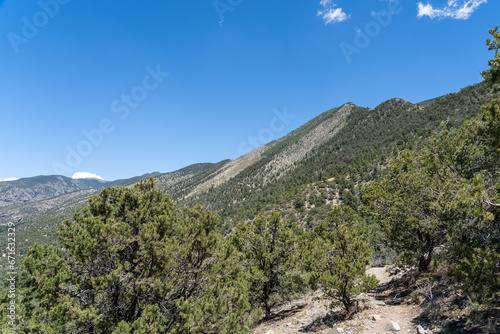 Great Sand Dunes National Park in Colorado on a sunny summer day  with mountains in the background