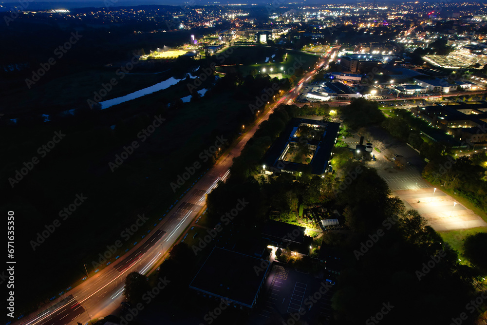 Gorgeous High Angle View of Illuminated British City at Just After Sunset Gorgeous High Angle View of Illuminated British City at Just After Sunset