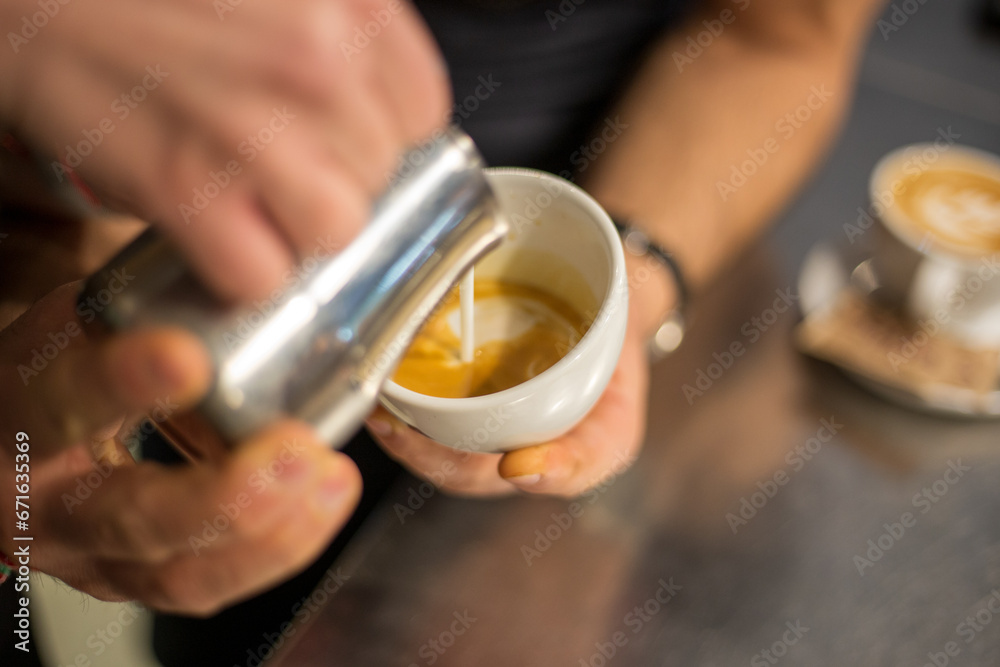 A barista Making coffee and cappuccino A barista Making coffee and cappuccino