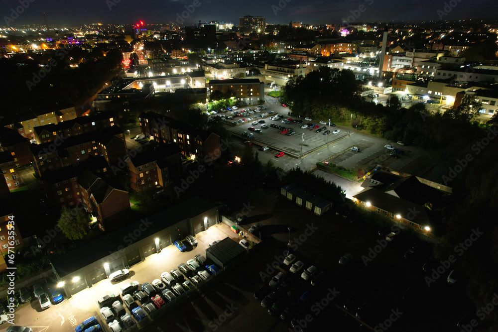 Fototapeta premium Gorgeous High Angle View of Illuminated British City at Just After Sunset