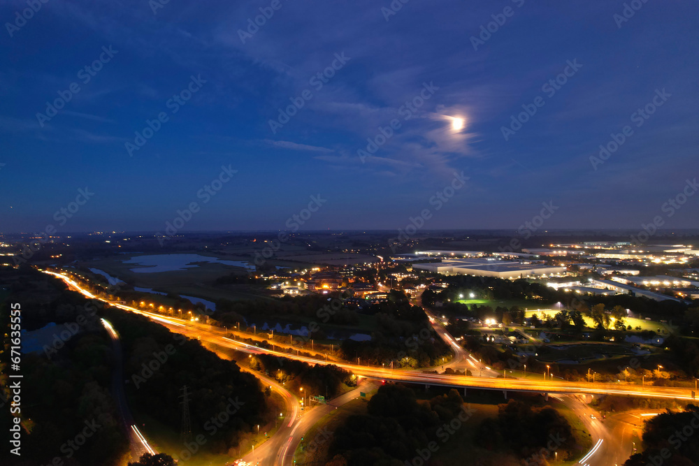 Gorgeous High Angle View of Illuminated British City at Just After Sunset