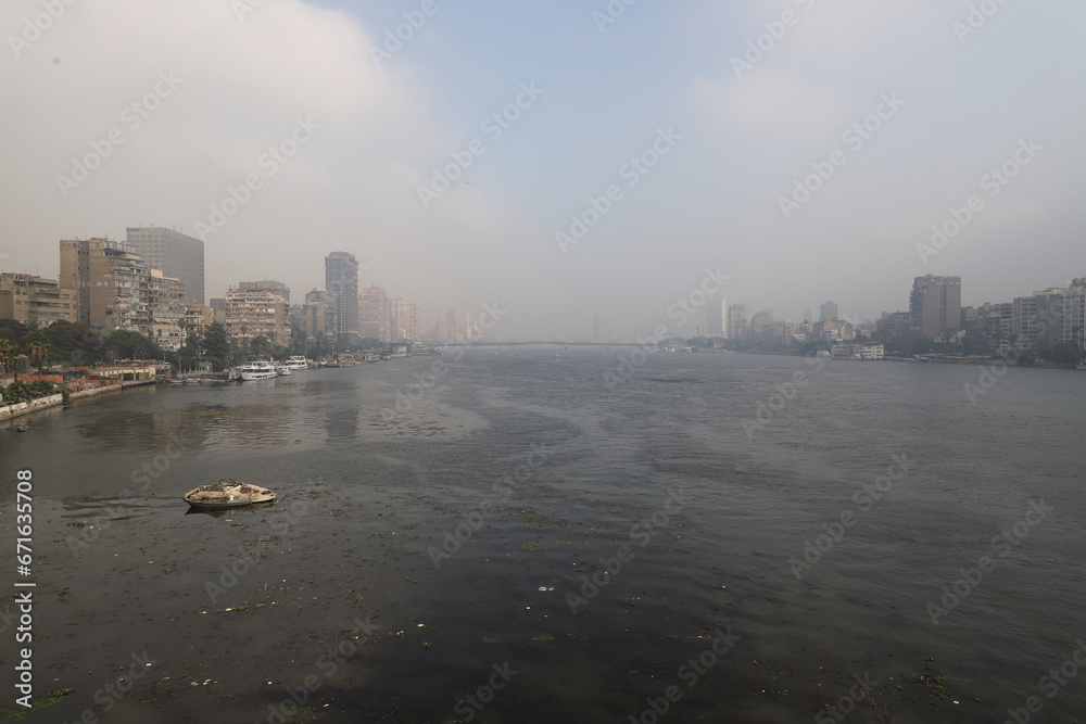 Naklejka premium The Nile, river, fog, buildings