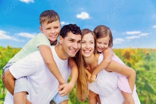 Family concept, happy young parents and children