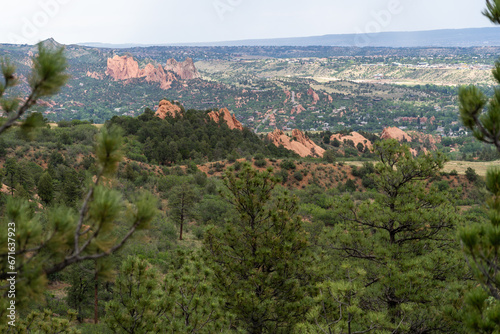 A view of Garden of the Gods from afar on a cloudy summer day in Colorado Springs, CO