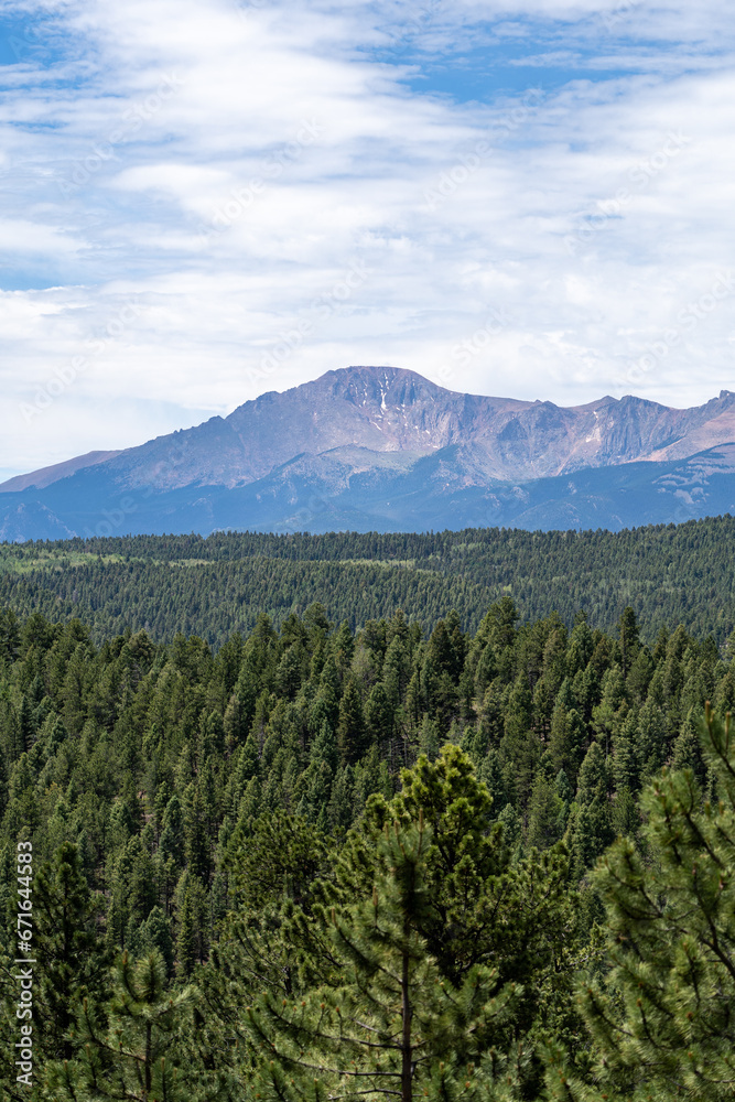 Pike's Peak as viewed from Lovell Gulch Trail in Pike National Forest near Woodland Park and Colorado Springs, CO on a sunny summer afternoon