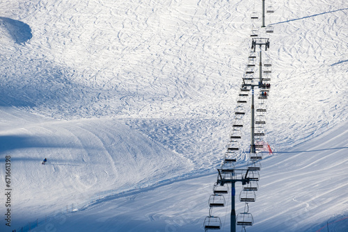 Winter journey unfolds cable car amid Andorra's snowy peaks alpine wonder photo