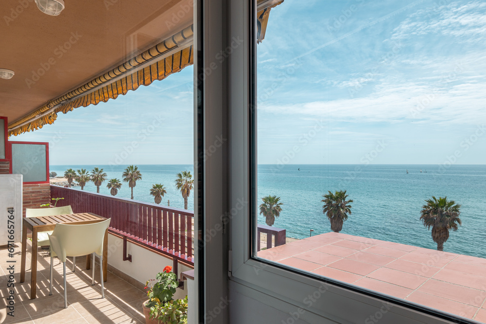 Terrace with table and seats in apartment in Vilassar de Mar