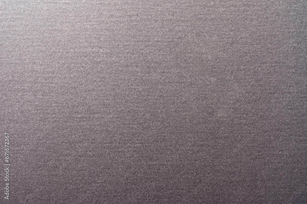Background with a fine grain uniform of anthracite color Background with a fine grain uniform of anthracite color