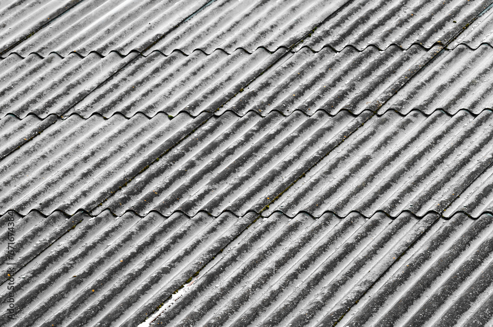 Background of snowy slate roof with wave texture Background of snowy slate roof with wave texture