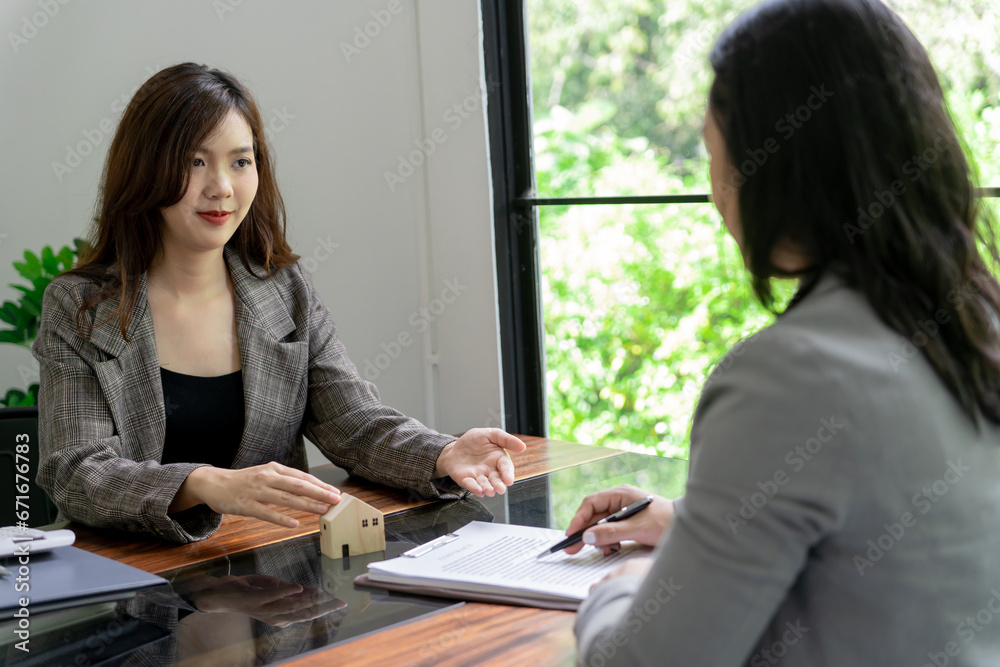 Business people signing contract making deal with real estate agent Concept for consultant home insurance.Real estate investment Property insurance security. Business people signing contract making deal with real estate agent Concept for consultant home insurance.Real estate investment Property insurance security.