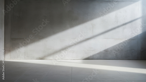 shadow on white concrete wall in the room from window with morning light
