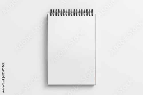 Notebook mockup. Blank workplace notebook. Spiral notepad on white background photo