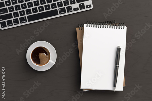 Notebook mockup. Blank workplace notebook. Spiral notepad on dark wooden desk photo