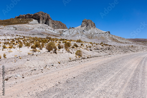 Traveling the famous Ruta40 in the scenic Argentinian highlands - fantastic views while driving through colorful and remarkably shaped mountains and watching wildlife in high altitude in South America