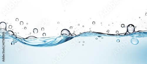 White background with a close up view of waves and bubbles in water