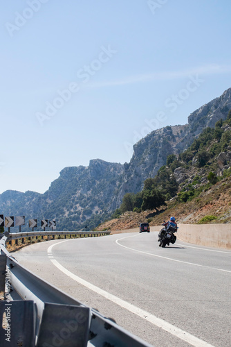 two motorcycles on mountain road in sardinia italy europe. Travel scene. Leisure activity on vacation. People exploring the island. Driving fun