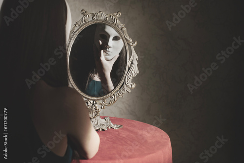 Obraz na plátně reflection of a vain woman with mask in front of the mirror, identity concept