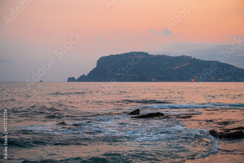 Fototapeta Naklejka Na Ścianę i Meble -  Beautiful eveining scene on Alanya beach in Turkey