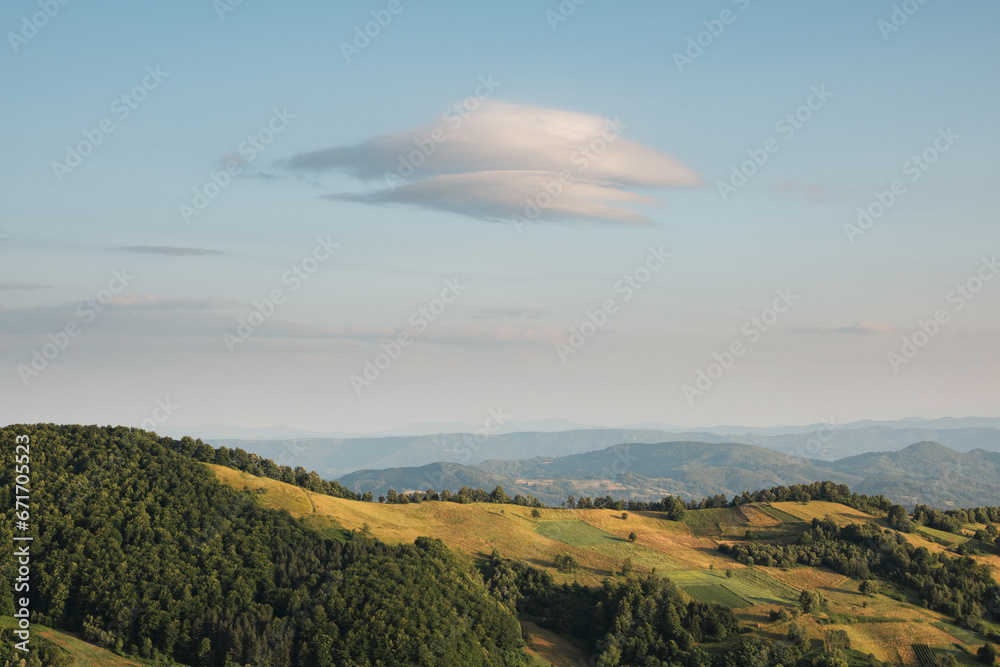 Fototapeta premium An interesting cloud over the mountains