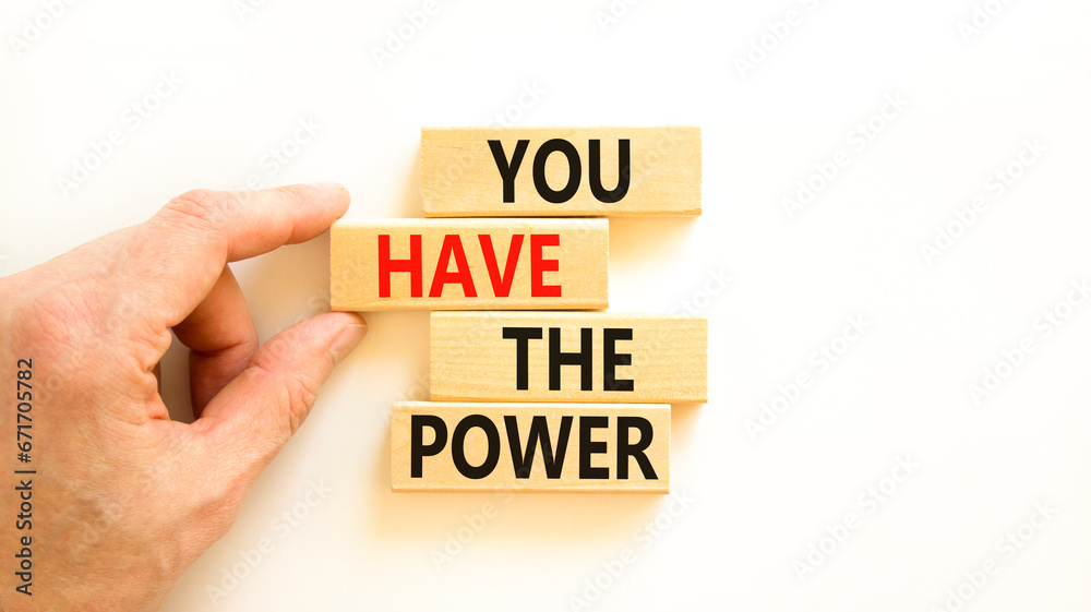 You have the power symbol. Concept word You have the power on beautiful wooden block. Beautiful white background. Businessman hand. Business motivational you have the power concept. Copy space. You have the power symbol. Concept word You have the power on beautiful wooden block. Beautiful white background. Businessman hand. Business motivational you have the power concept. Copy space.