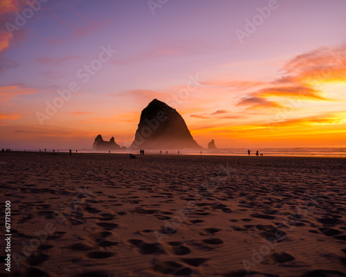 haystack rock sunset on the beach © Lachlan