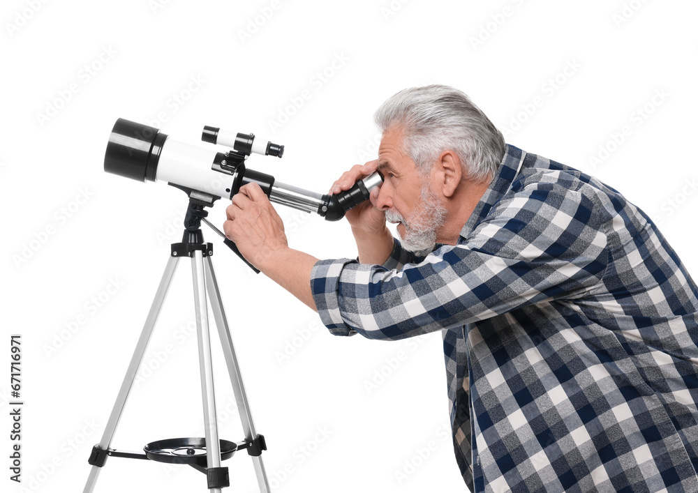 Senior astronomer looking at stars through telescope on white background