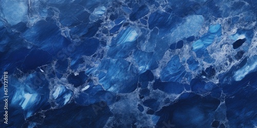 A detailed close up of a blue marble surface. This image can be used for various design projects or as a background texture.