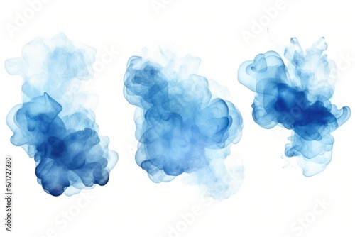 Blue inks floating in the air, creating a mesmerizing abstract pattern. Suitable for artistic projects and designs.