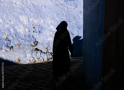 silhouette on the blue streets of Chefchaouen Morocco © Agata Kadar