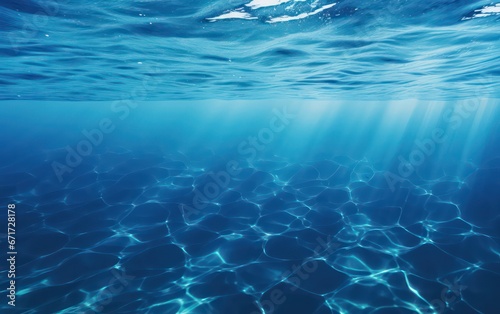 Serene blue water surface, calm and captivating. © Nattadesh