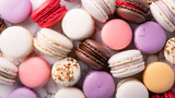 A close-up of delectable macarons exquisitely laid on a marble table - perfect for food vloggers and sweet tooths.