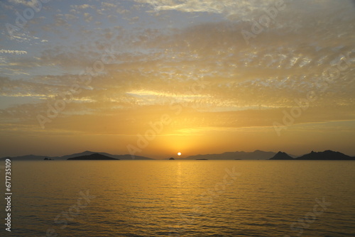 sunset on the beach. Seaside town of Turgutreis and spectacular sunsets. Selective Focus.