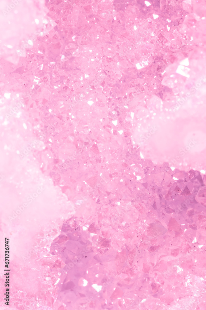 Amethyst pink crystals. Gems. Mineral crystals in the natural environment. Texture of precious and semiprecious stones. Seamless background with copy space colored shiny surface of precious stones.