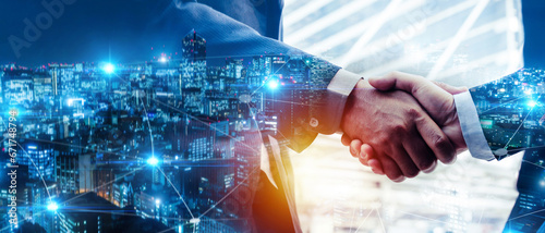 Partnership. double exposure image of investor businessman handshake with customer partner and abstract night city background, investment, business finance, teamwork and successful concept