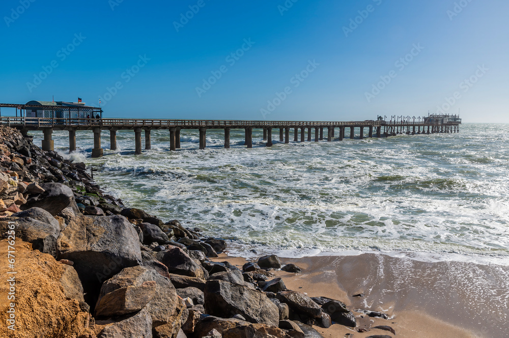 A view from the shore along the pier at Swakopmund, Namibia during the dry season