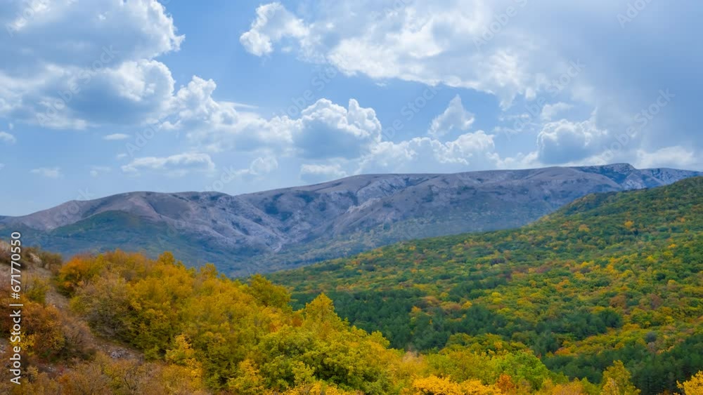 red autumn mountain valley under pale cloudy sky time lapse scene red autumn mountain valley under pale cloudy sky time lapse scene