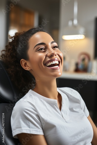 Young joyful African American woman at the dentist office