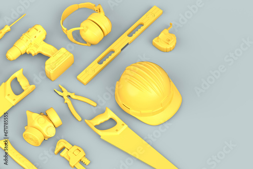 Top view of monochrome construction tools for repair on grey background photo