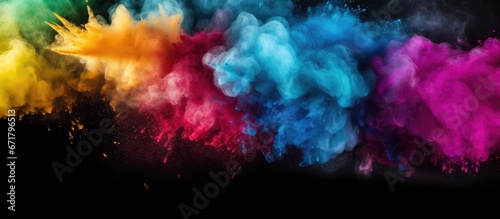 The background is filled with abstract powder that splattered creating a frozen motion of color powder exploding or being thrown The surface has a multicolored glitter texture over a black 