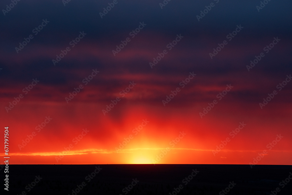 Dramatic sunset over polar tundra