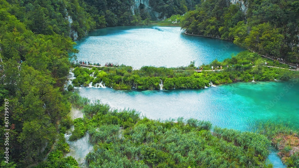 Plitvice Lakes National Park conserves a strikingly beautiful and intact series of lakes formed by natural tufa barriers. Plitvice Lakes National Park conserves a strikingly beautiful and intact series of lakes formed by natural tufa barriers.