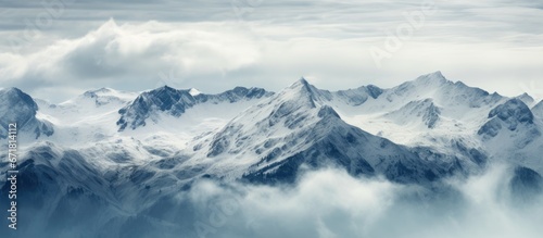 Switzerland s mountains covered by clouds © AkuAku