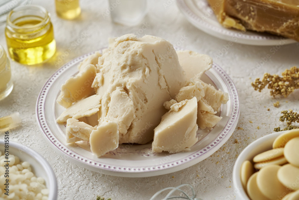 Shea butter with bees wax, essential oils and cocoa butter - ingredients for natural cosmetics Shea butter with bees wax, essential oils and cocoa butter - ingredients for natural cosmetics